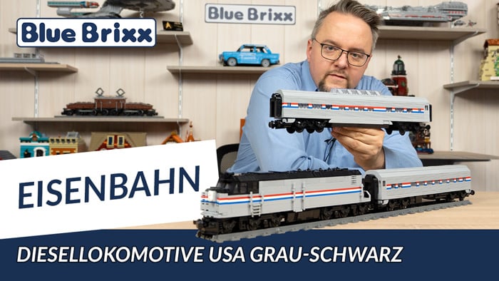 Youtube: Diesellokomotive USA grau-schwarz mit Personenwagen von BlueBrixx