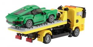 tow Truck with a green Sportcar