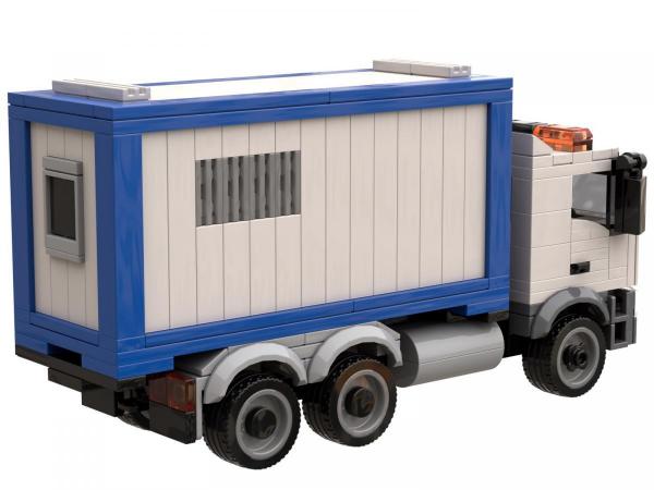 Truck with construction container