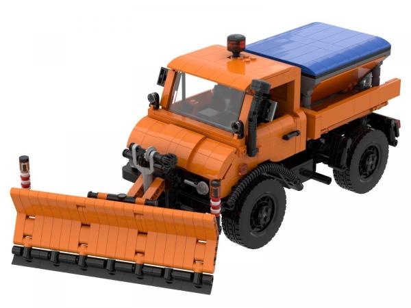 Salt spreader and snow plough attachment for municipal multi-purpose vehicle 1:18