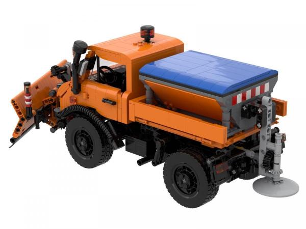 Salt spreader and snow plough attachment for municipal multi-purpose vehicle 1:18